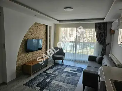 ADALİFE YATIRIMDA EŞYALI BALKONLU ÇINARDA 1+1