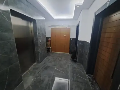 Seferihisar, Ürkmez’de Çarşı Merkezinde, Asansörlü, Denize 200 metre Satılık 1+1 daire