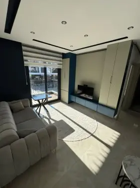 ASMALIEVLER MAHALLESİNDE KİRALIK SIFIR 1+1 BALKONLU APART